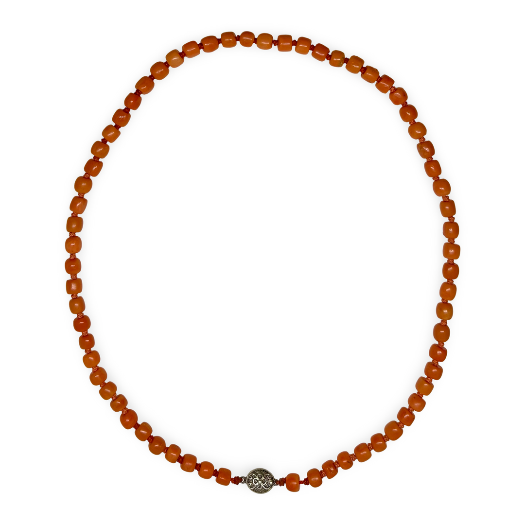 Old coral necklace with large silver pearl