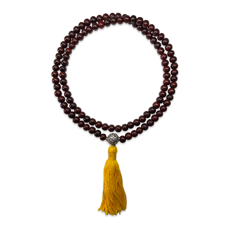 Delicate sandalwood mala with silver bead