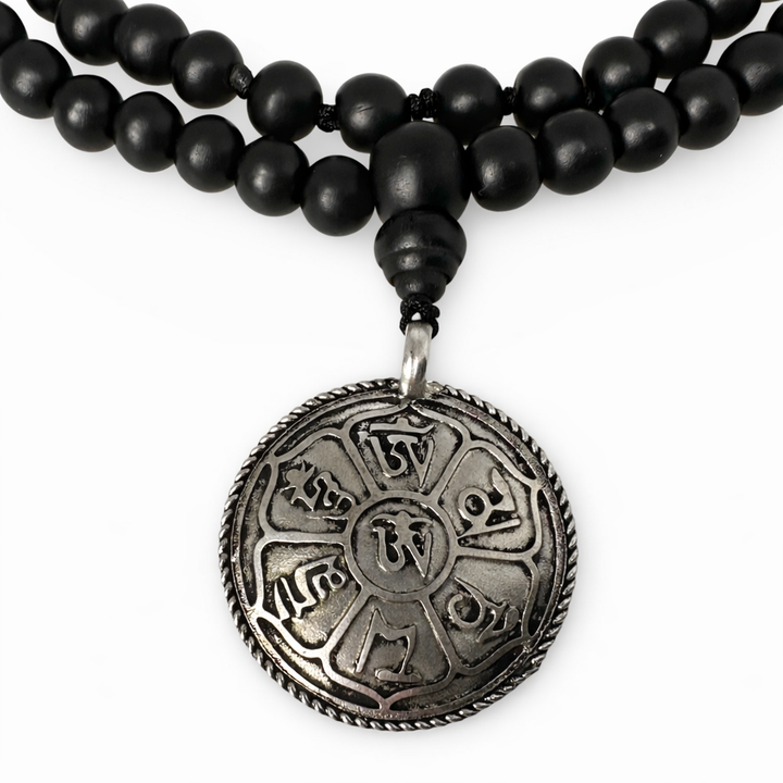 Mala in palissandro con pendente mantra 