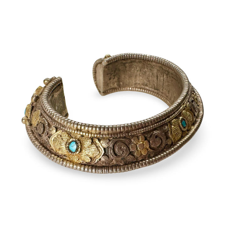 Antico bracciale dal Bhutan – argento, parzialmente dorato con turchese