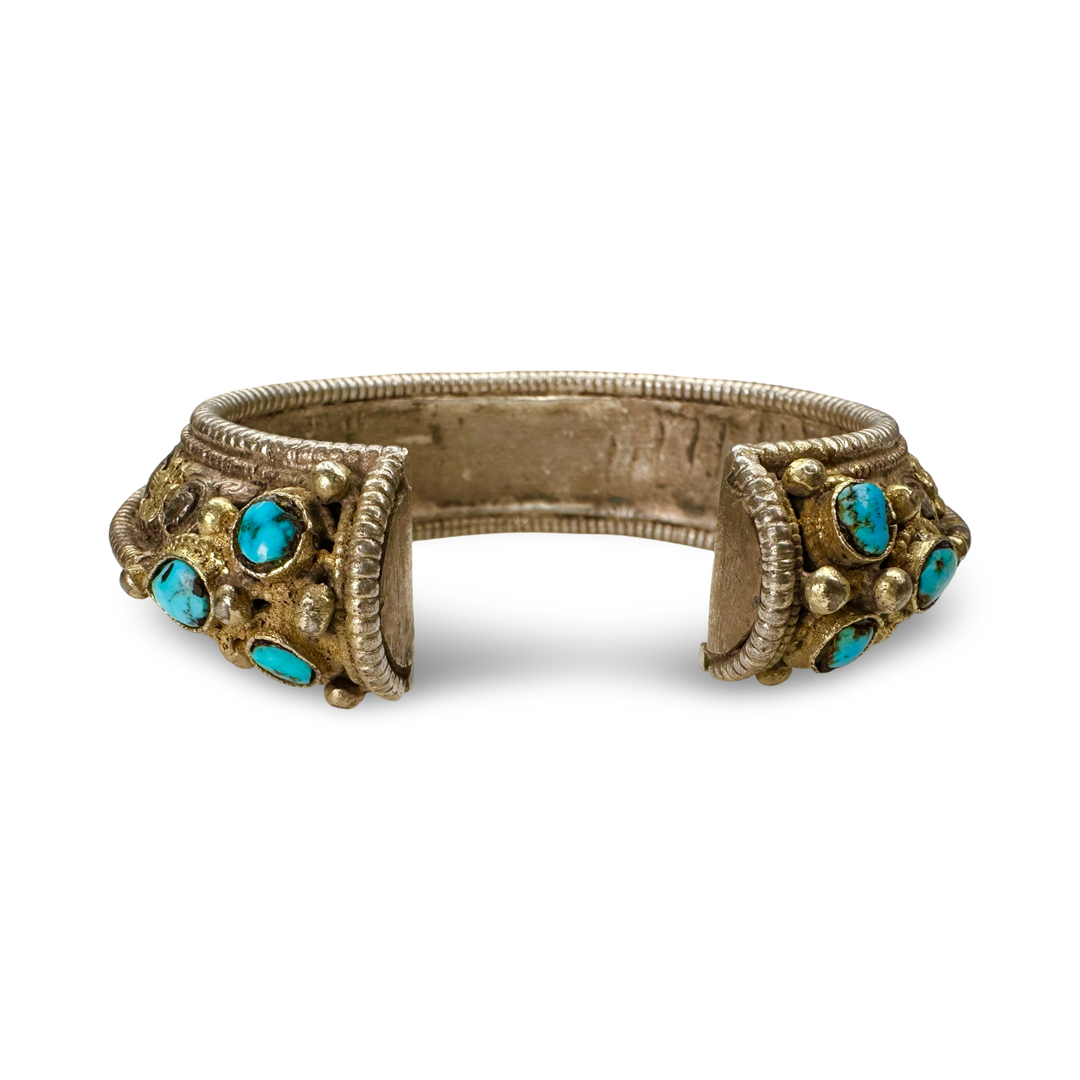 Antico bracciale dal Bhutan – argento, parzialmente dorato con turchese