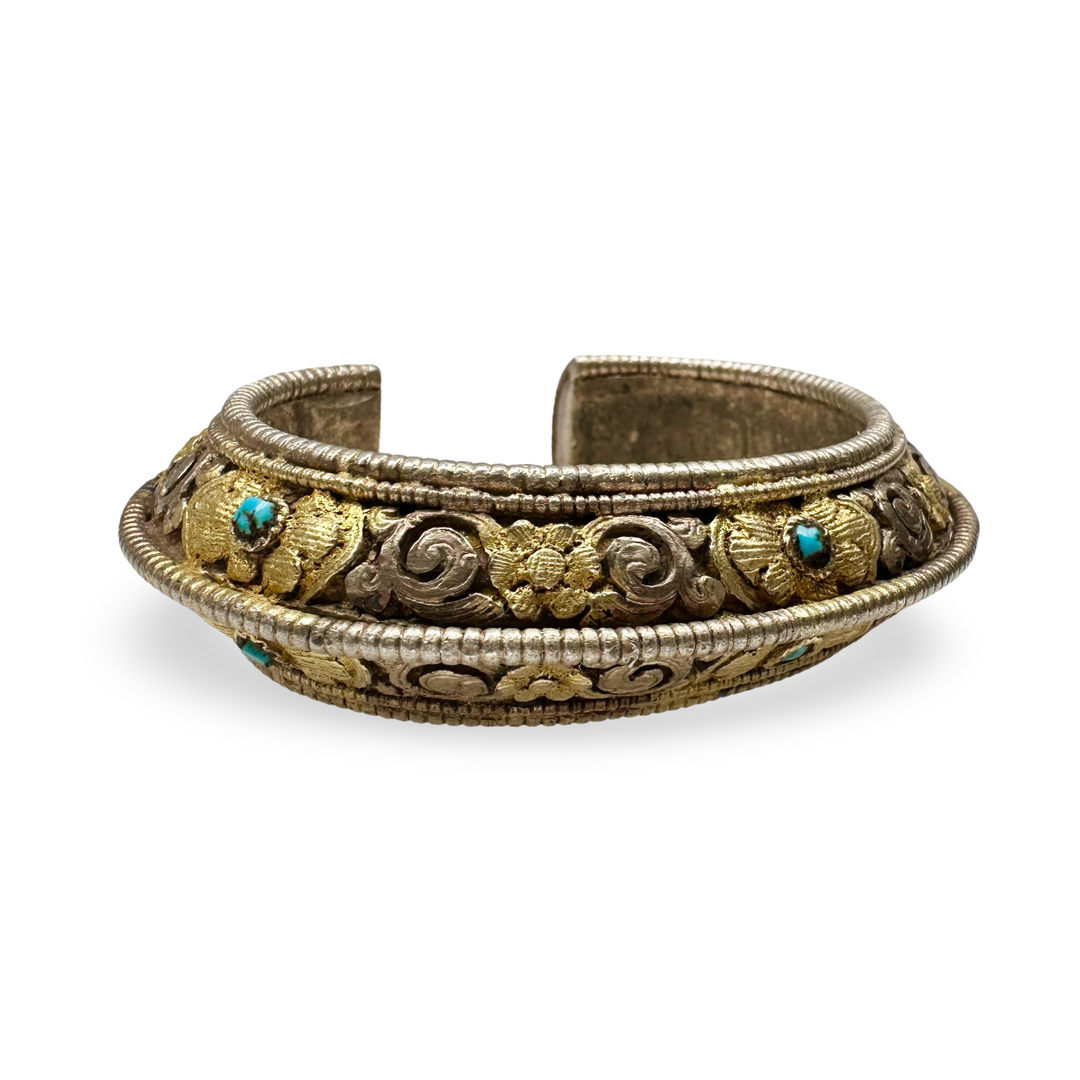 Antico bracciale dal Bhutan – argento, parzialmente dorato con turchese