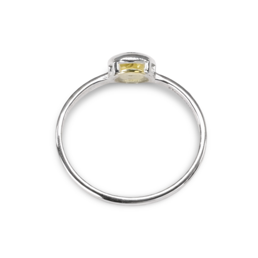 Delicate, elegant silver ring with colored oval gemstone