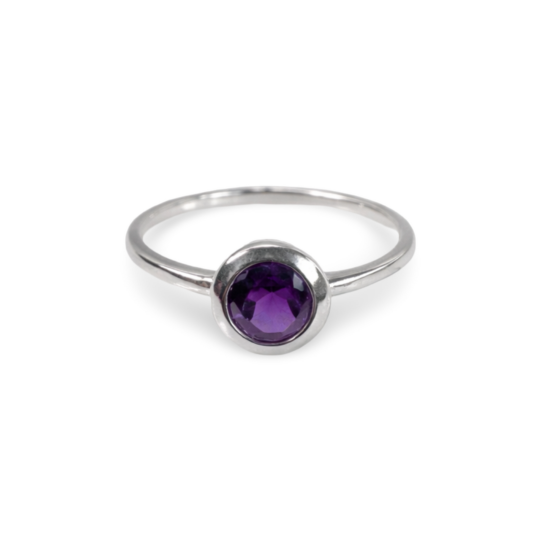 Delicate, elegant silver ring with colored oval gemstone