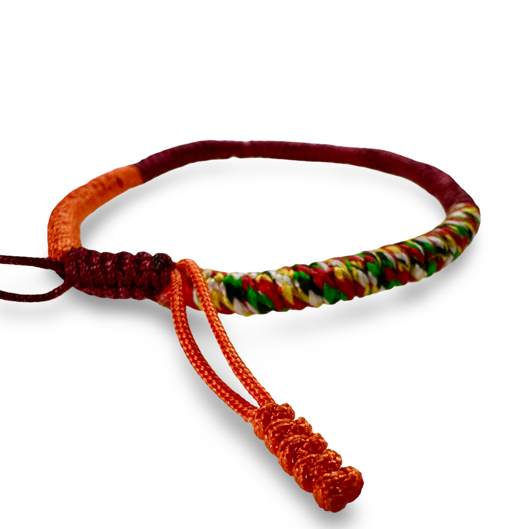 Bracelet porte-bonheur tibétain aux tons orange/violet et aux couleurs tibétaines