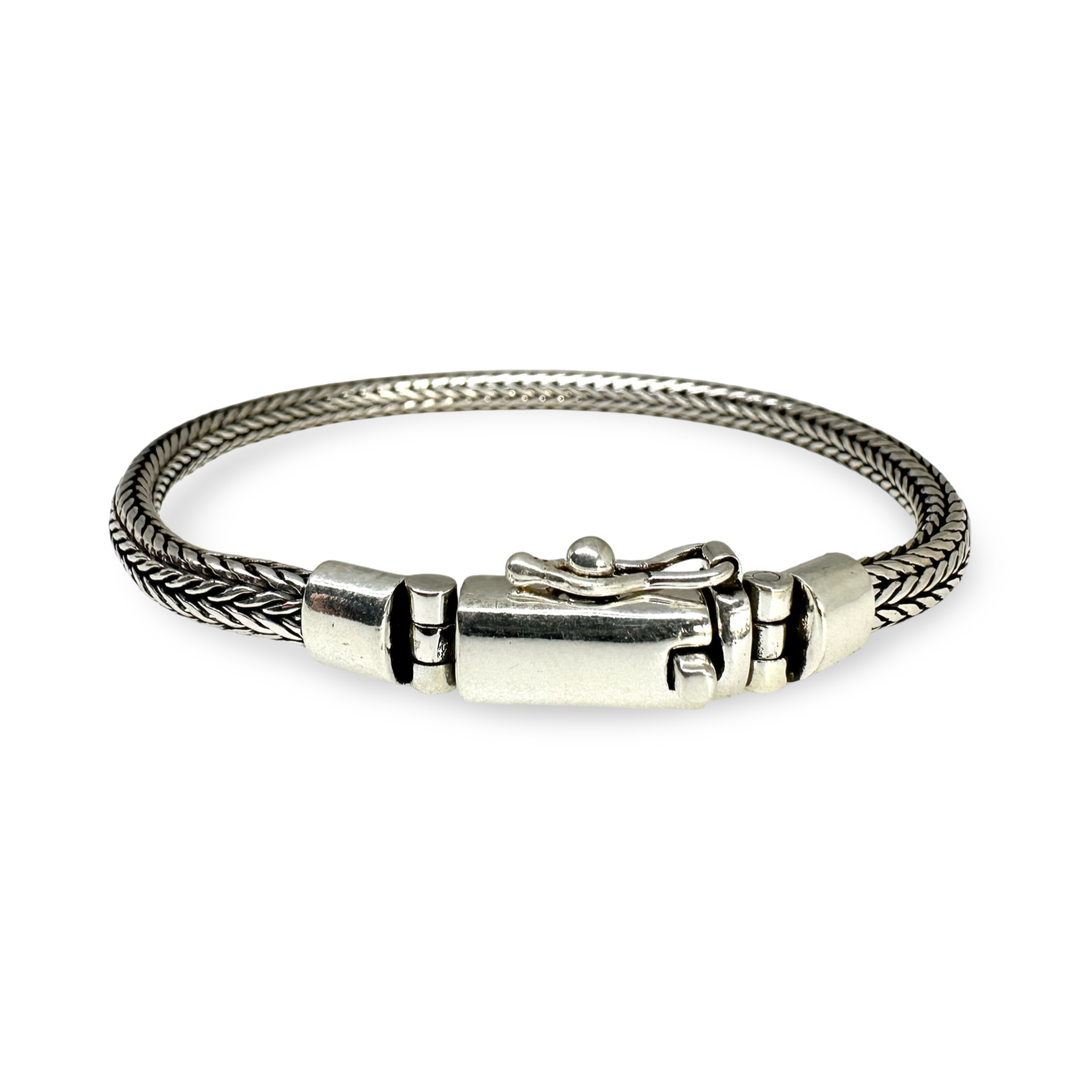 Elegante bracciale a forma di serpente in argento con chiusura sorprendente