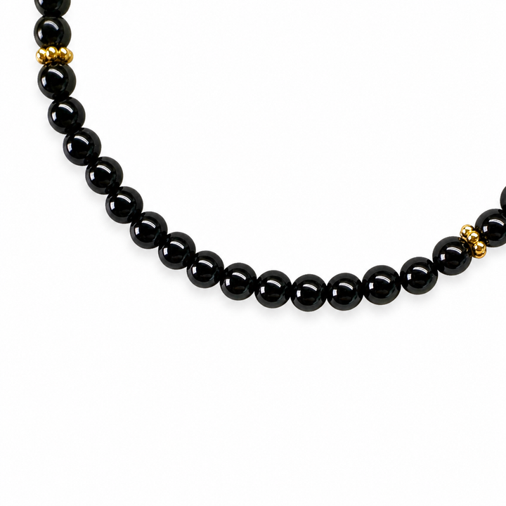 Feines Onyx-Armband mit vergoldeten Silberperlen