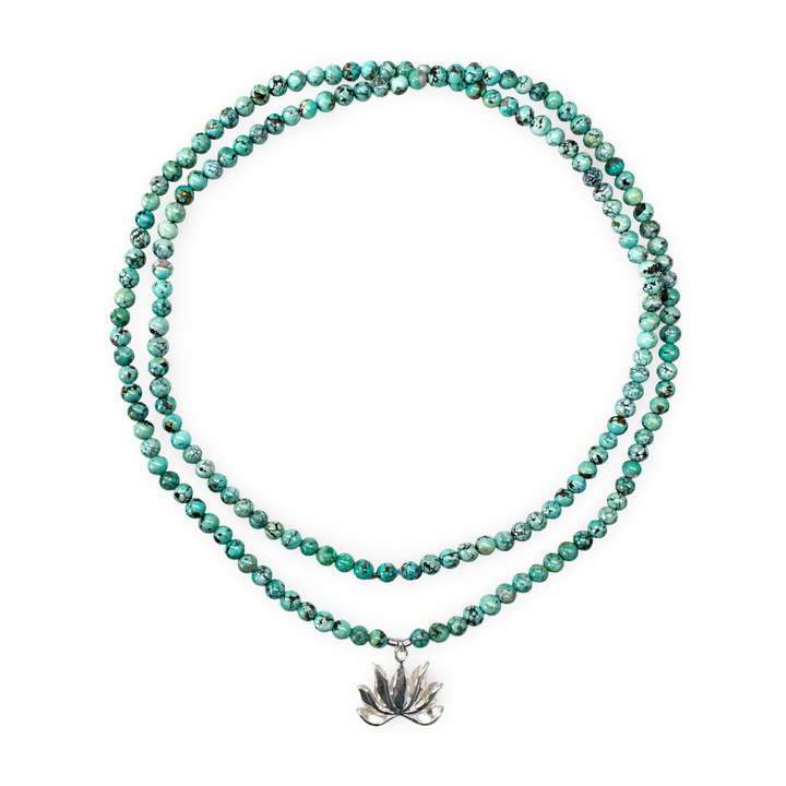 Tibetan turquoise necklace with silver lotus pendant