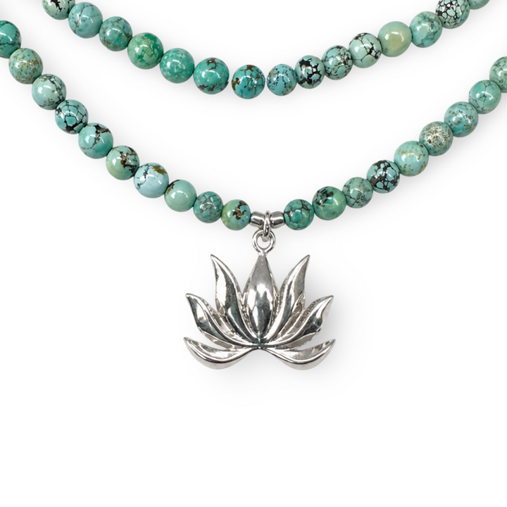 Tibetan turquoise necklace with silver lotus pendant