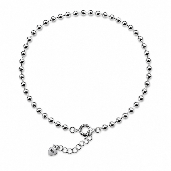 Bracelet de cheville composé de boules d'argent
