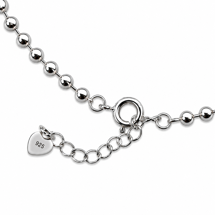 Bracelet de cheville composé de boules d'argent