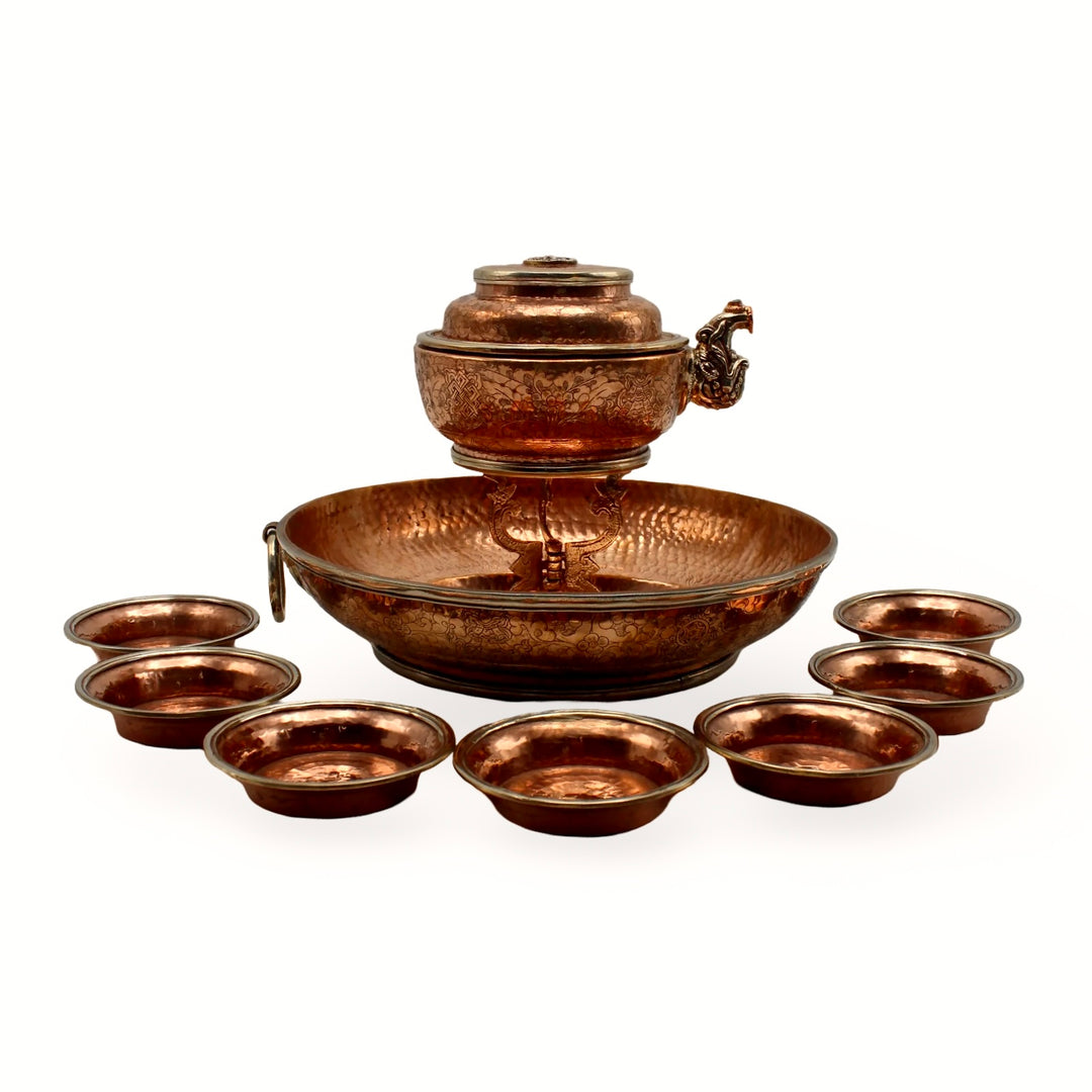 ཛམ་བྷ་ལའི་ཆུའི་མཆོད་ཆས་(ཆུ་ཏོར) - ཟངས་བརྡུངས་པ།