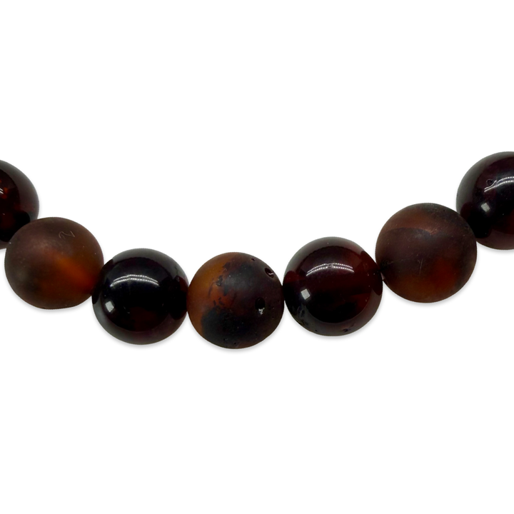 Dunkles Bernstein-Armband matt und glänzend