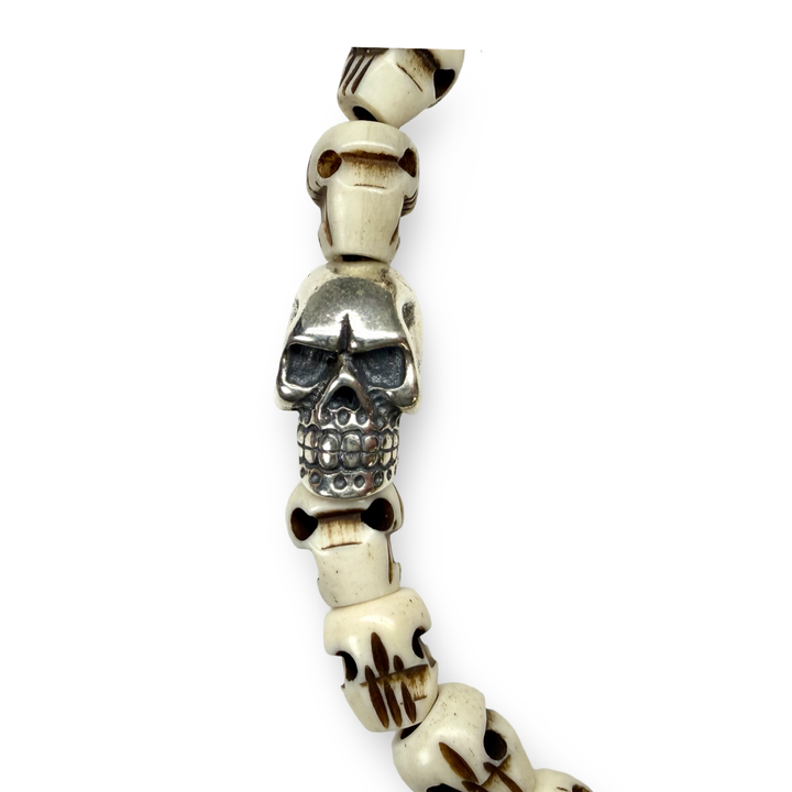 Bracciale con teschi in osso e teschio in argento