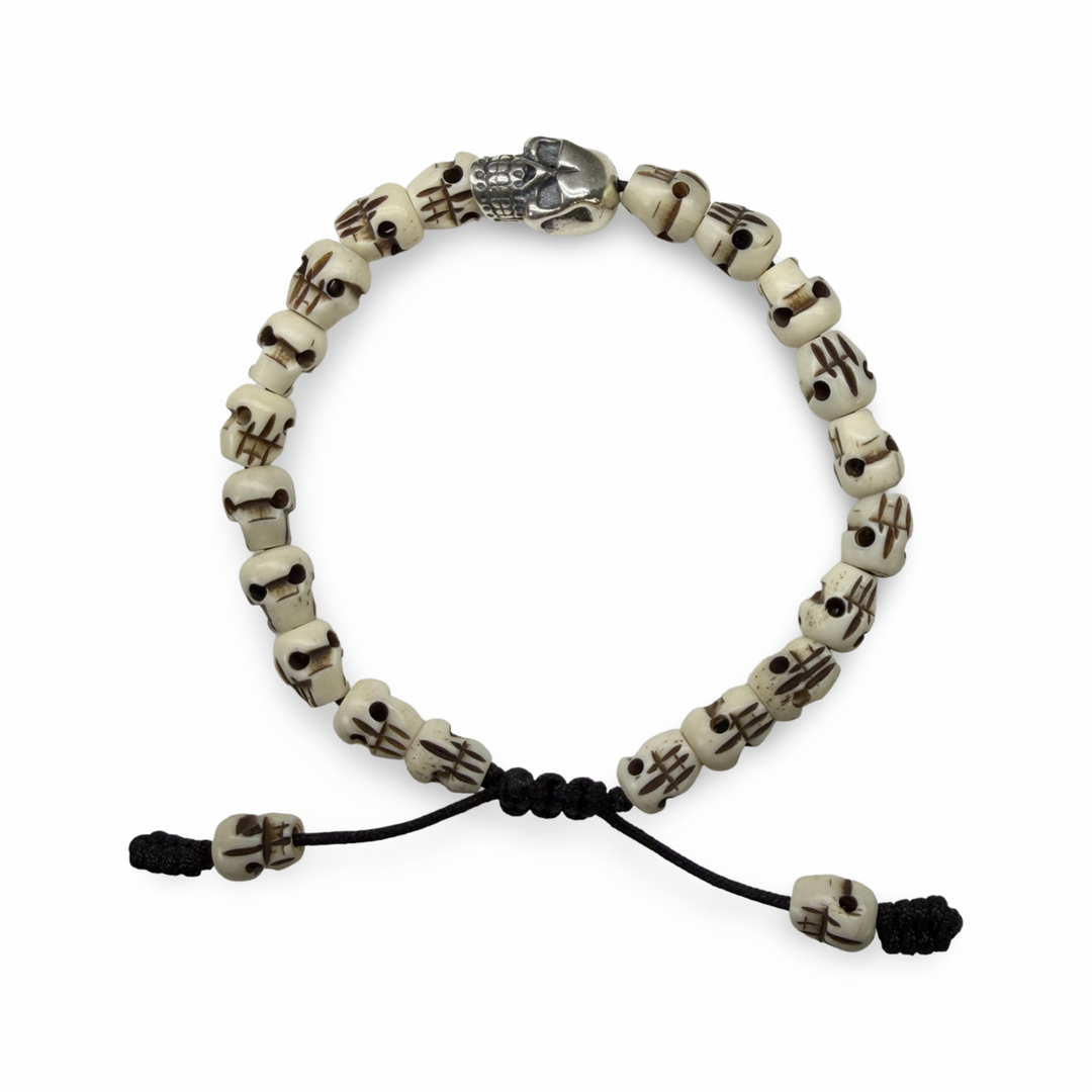 Bracciale con teschi in osso e teschio in argento