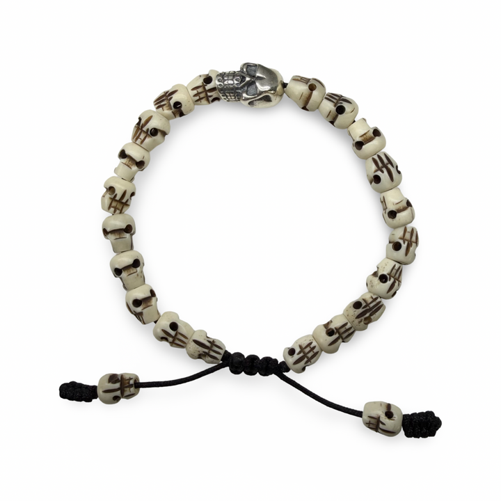 Bracciale con teschi in osso e teschio in argento