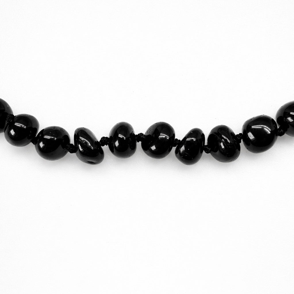 Halskette aus dunkelroten Bernsteinen - Atelier Tibet