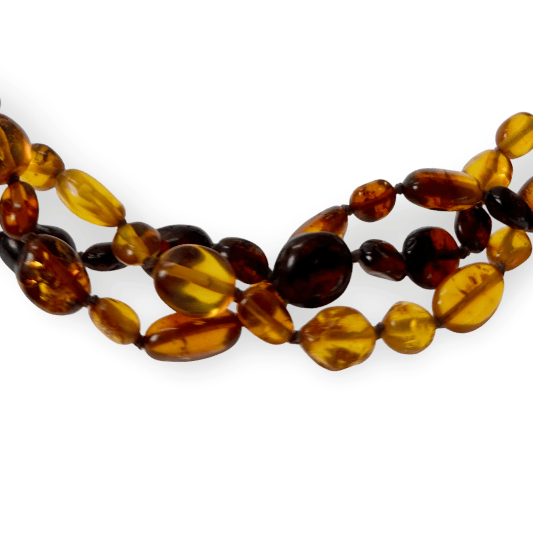 Sehr lange Kette aus verschiedenfarbigen Bernsteinen - Atelier Tibet