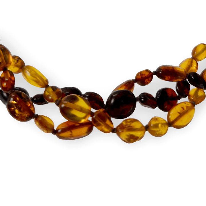 Sehr lange Kette aus verschiedenfarbigen Bernsteinen - Atelier Tibet