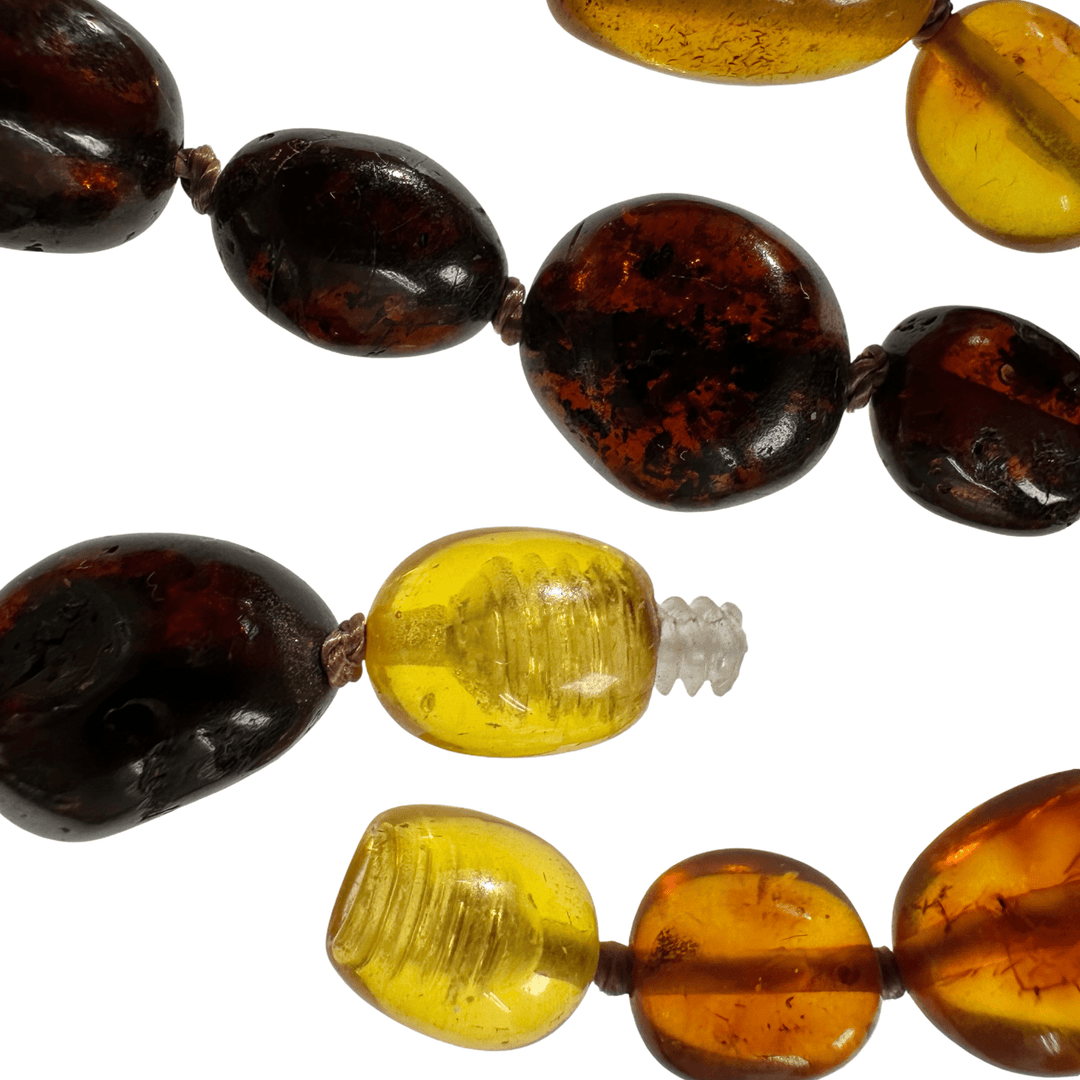 Sehr lange Kette aus verschiedenfarbigen Bernsteinen - Atelier Tibet
