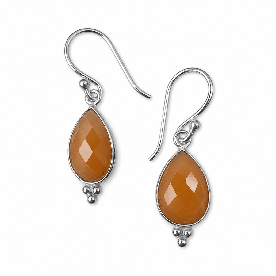 Silber - Ohranhänger mit tropfenförmigem orangem Mondstein - Atelier Tibet