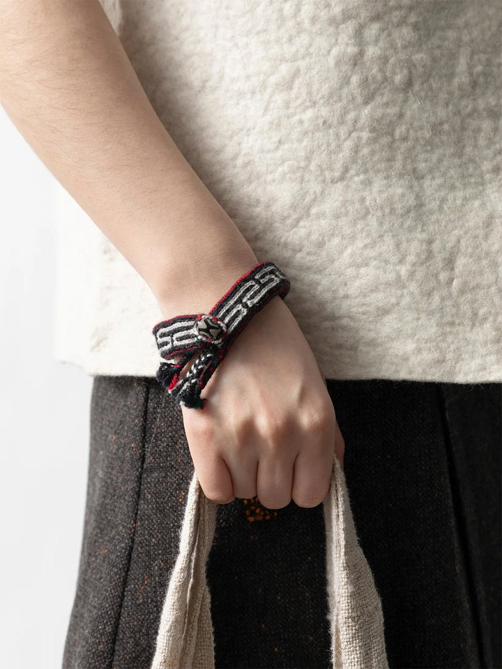 Wollarmband «Dzi», handgewebt in Tibet · CHARU × Tsoten - Atelier Tibet