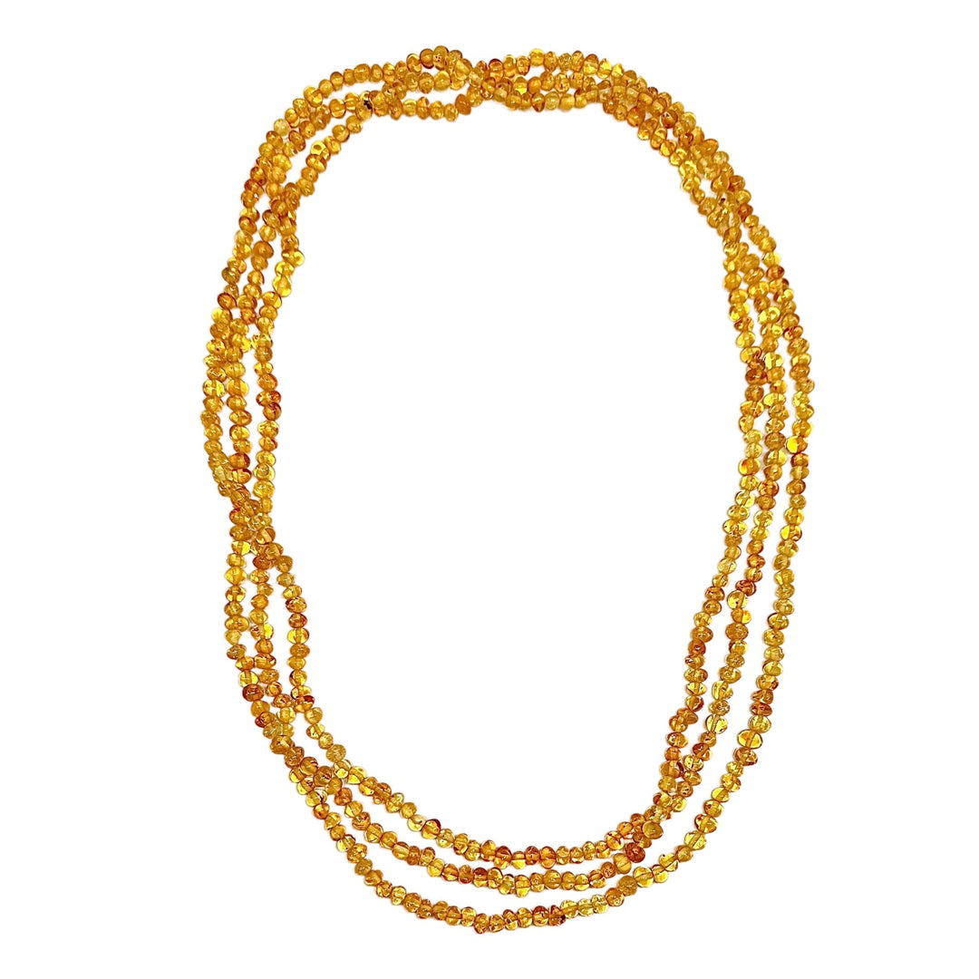 Lange Dreifach-Halskette aus honigfarbigen Bernsteinen - Atelier Tibet